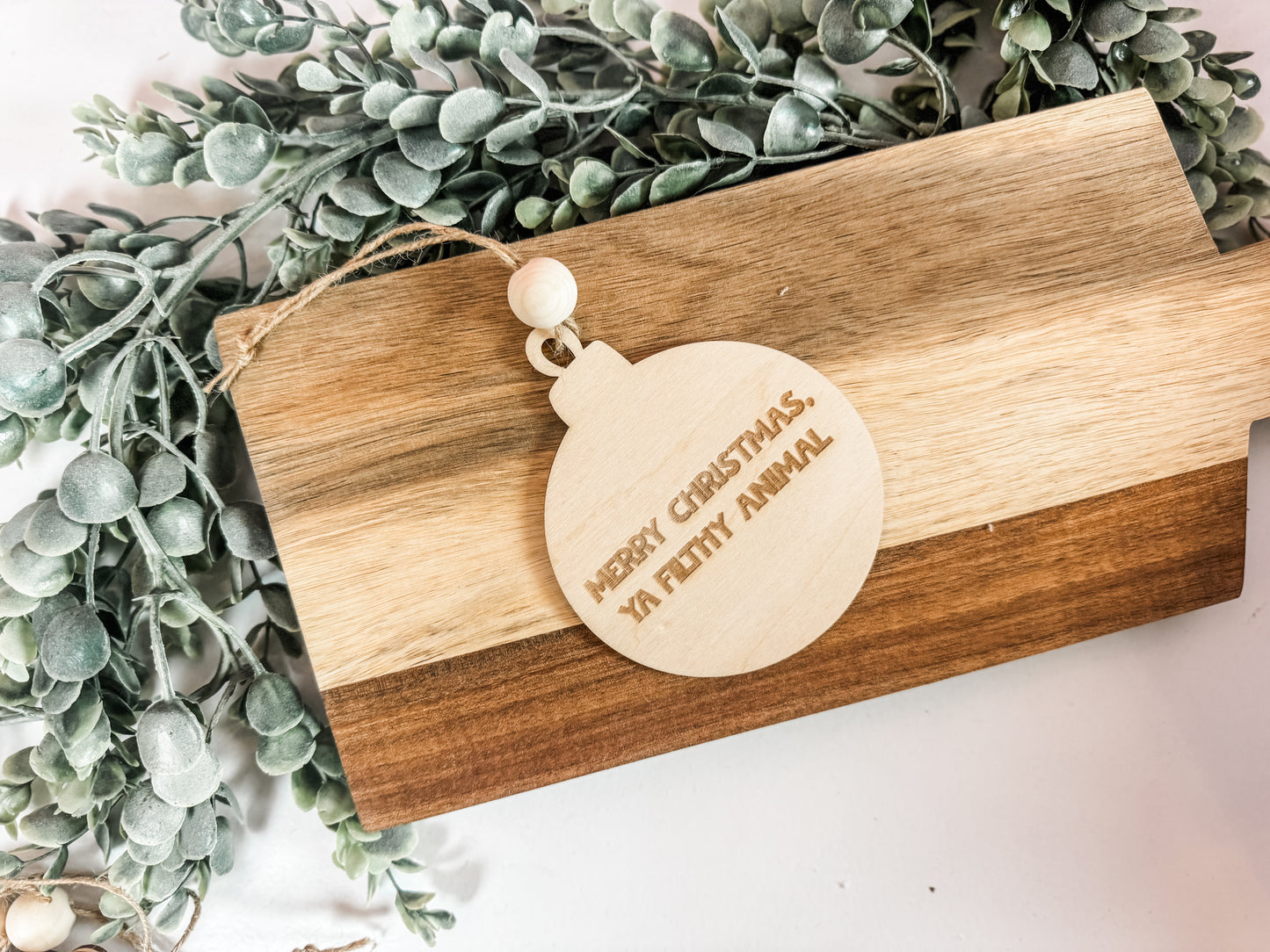 Christmas 2025 Ornament – Round “Merry Christmas, Ya Filthy Animal” Wooden Ornament